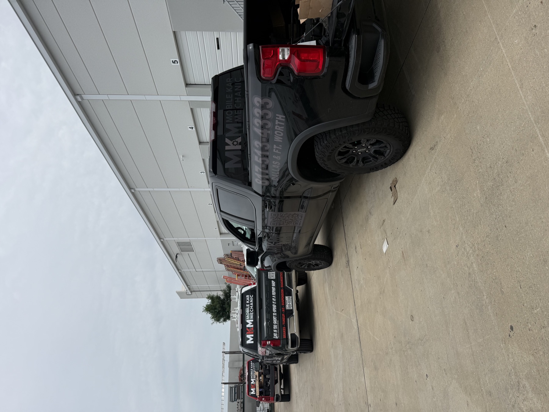 Mobile Kar Mechanic trucks parked at the warehouse